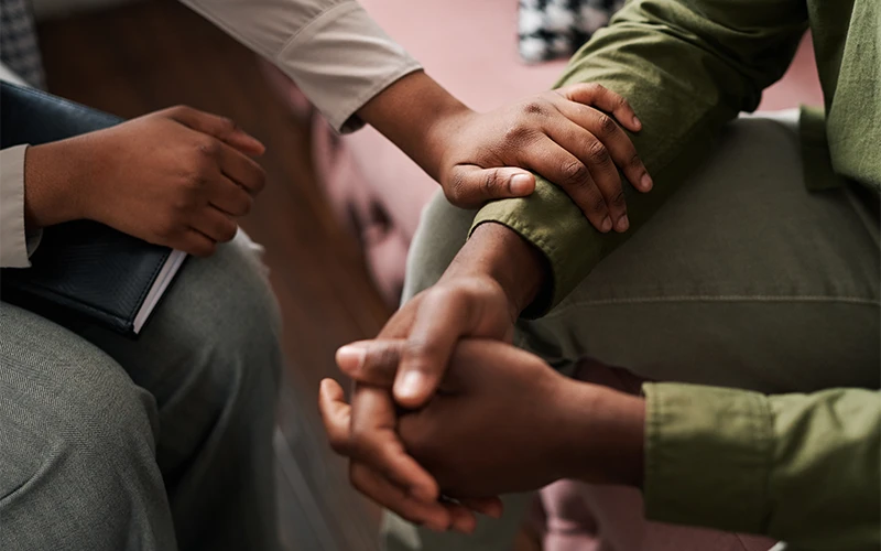 Therapist Comforting Hands